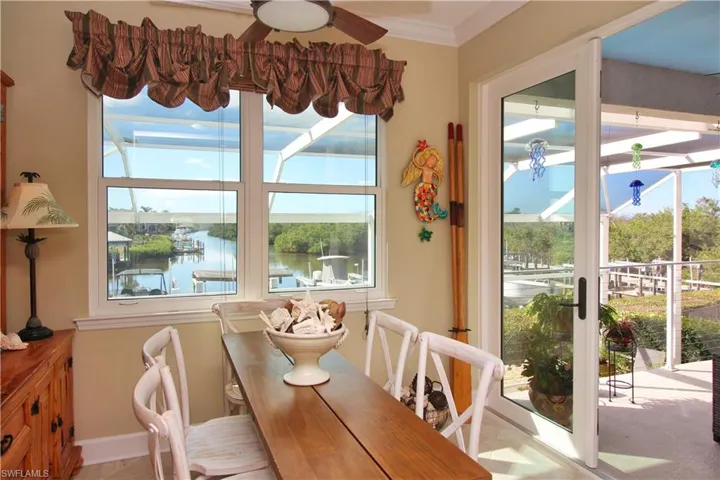 Dining area with spectacular water and sunset views!