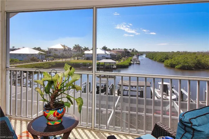 View down the Canal from your screened Porch off the Primary Suite