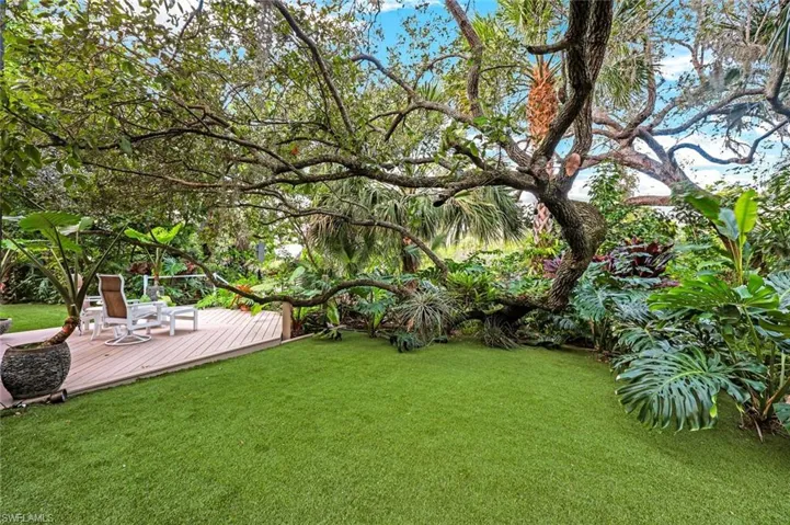 Home is surround by faux grass...GREEN and GORGEOUS all year long!