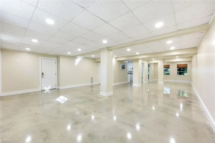 Lower level floor has been artistically redone.