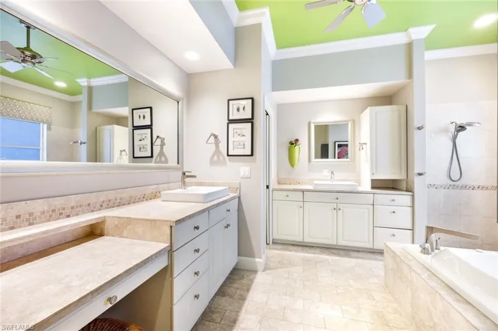 Spa-like ensuite with separate sink areas, a beautiful shower, soaking tub and plenty of cabinet space!