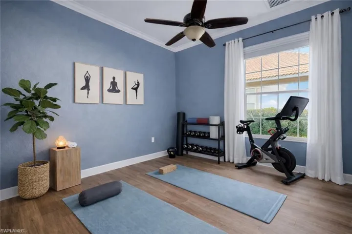 Virtually staged as an exercise room