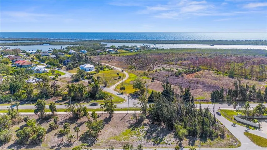 View of property location with a nearby body of water