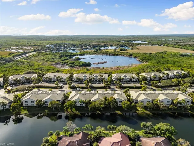 Aerial view of residential area with a nearby body of water
