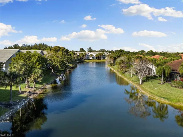 Water view featuring a tree filled landscape