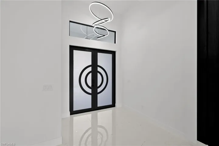 Detailed view of baseboards and french doors
