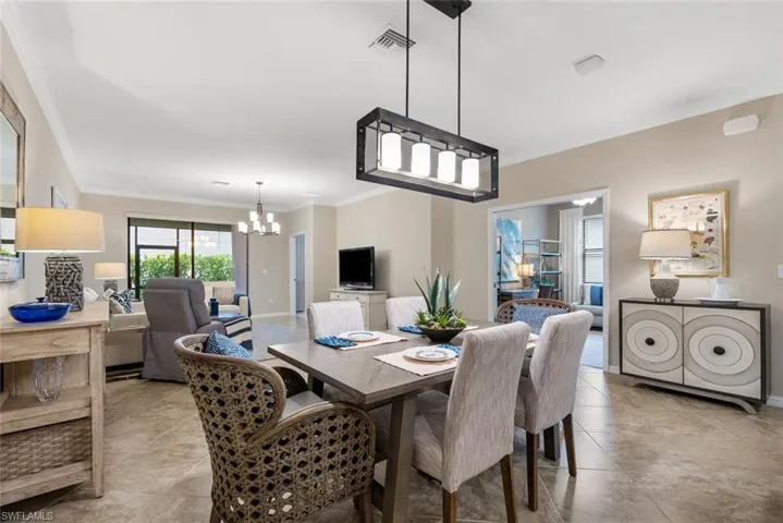 Dining space with a notable chandelier