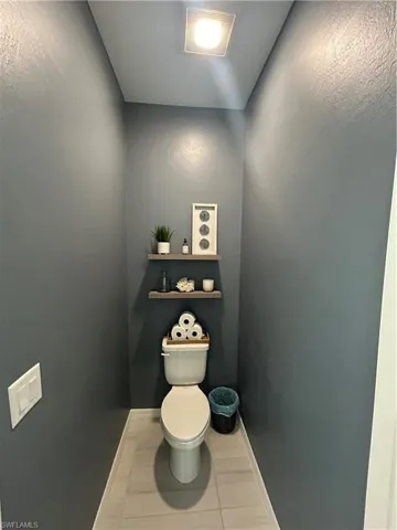 Tastefully painted private water closet