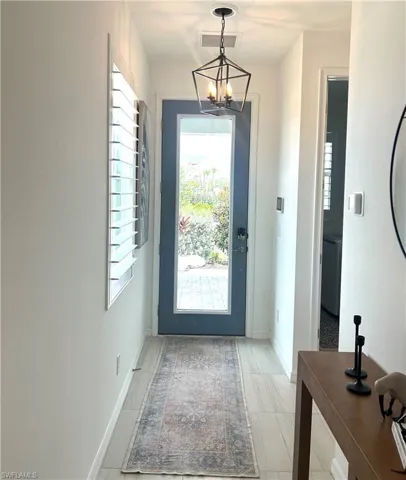 Upgraded impact glass front door lets in lots of natural light!