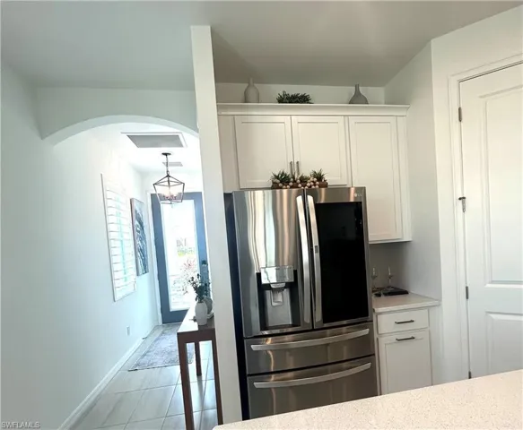 Upgrades: Extended height cabinets with crown molding & hardware, refrigerator, trash & recycling cabinet, tile backsplash  & additional outlets