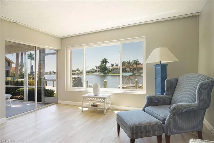 Great Room overlooks SOOTHING WATERVIEWS........aaaaahhhhh THIS VIEW IS VERY RARE ESPECIALLY IN THIS PRICE POINT