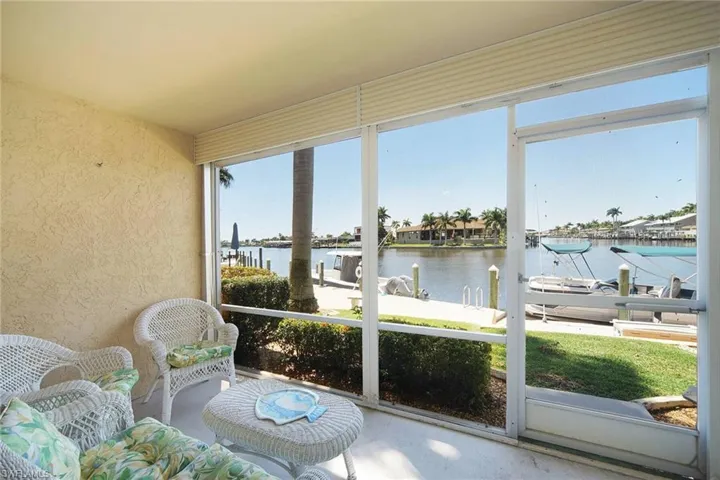 Spacious Lanai for morning coffee or Sunset wine watching boats heading back in....Roll Down Hurricane Shutters