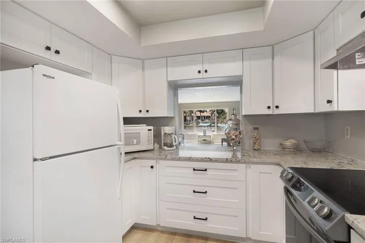 New Kitchen, New Flooring thruout, Granite, New Appliances including Set-In Range & Hood and Dove-Tailed Soft-Close Cabinetry