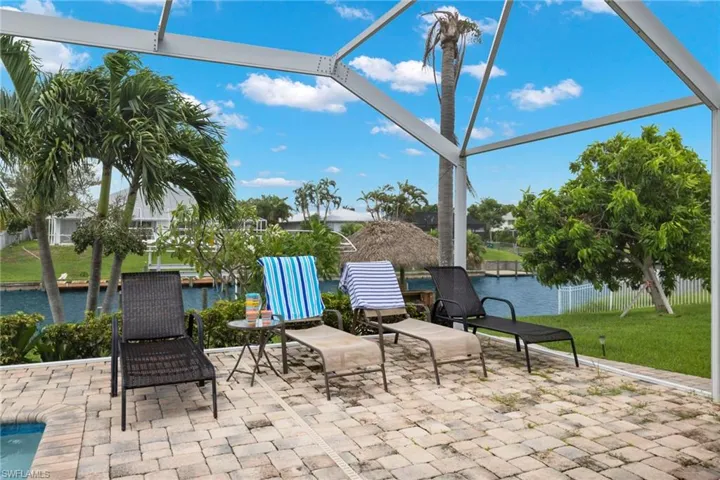 View of patio / terrace with a water view