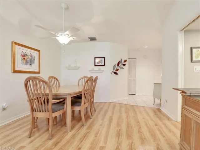 Dining room featuring light wood-type flooring and ceiling fan