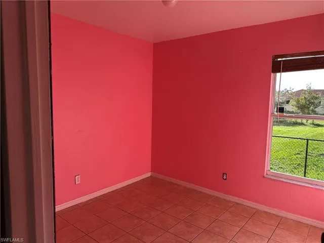 View of tiled spare room