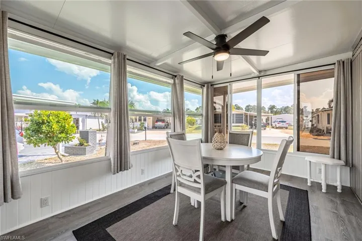 Sunroom with wood finished floors