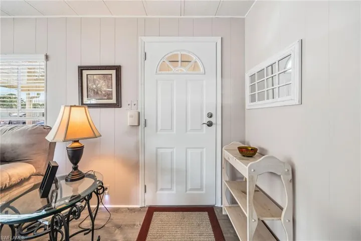 Entrance foyer featuring light wood-style floors