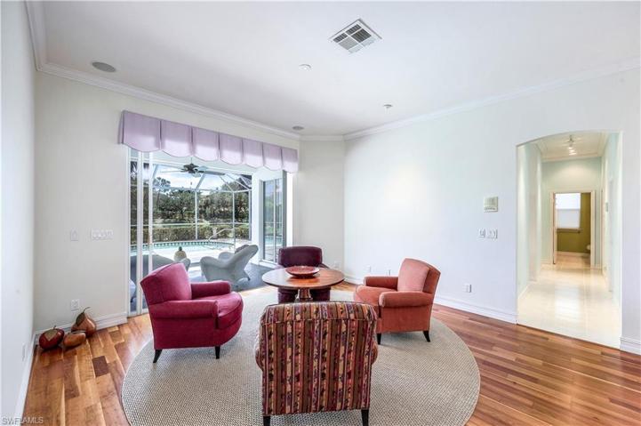 Formal living area with pocketing sliders to the pool