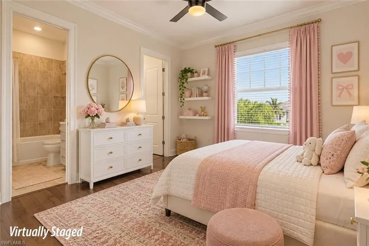 BEDROOM #1.  SHARES BATH, VIA POCKET DOOR, WITH BONUS ROOM.  WALK-IN FINISHED CLOSET.