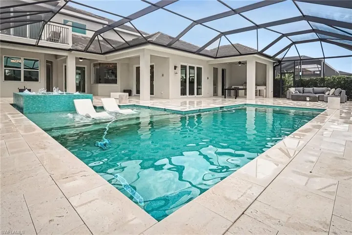 VIEW OF POOL TOWARD BACK OF HOME.
