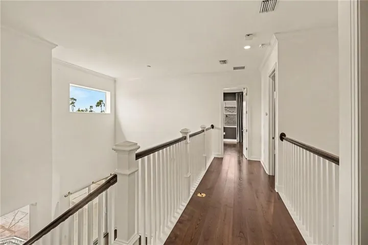 UPSTAIRS.  ENTRANCE TO BONUS ROOM AT REAR MIDDLE.