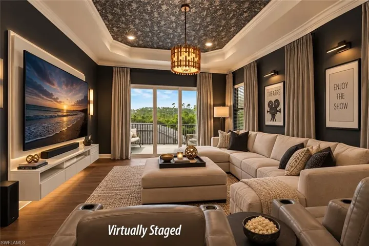 BONUS ROOM STAGED AS A MEDIA ROOM.  CURTAINS CAN COVER ENTIRE SOUTH AND WEST SIDES OF ROOM.