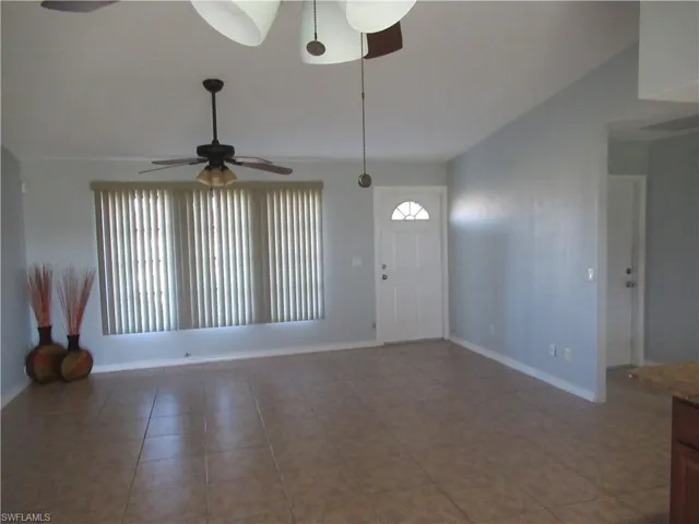 Tiled entryway with ceiling fan