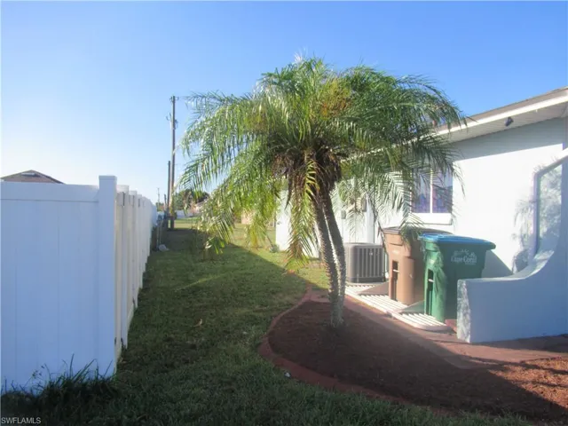 View of yard featuring central AC unit