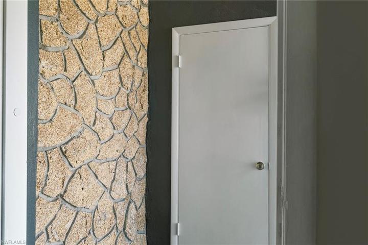 Door to the garage located in the front enclosed entry way.