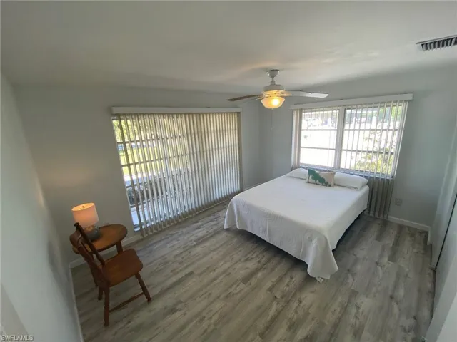 Full bathroom with vanity and a shower with shower curtain