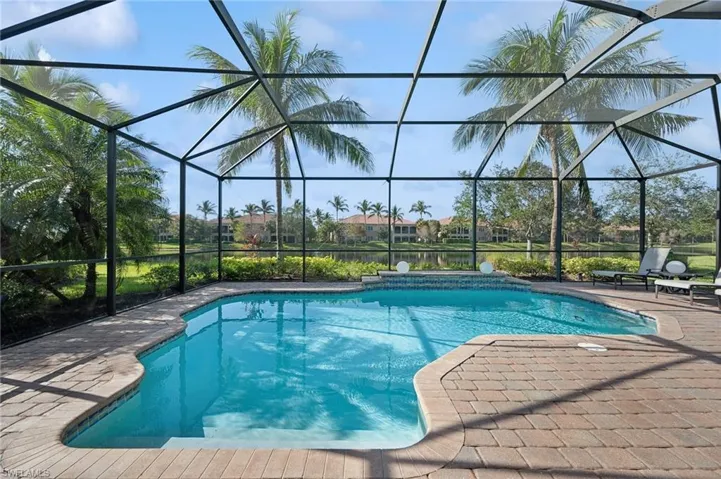 View of pool featuring a lanai and a patio area