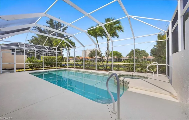 View of pool featuring a patio area and a lanai