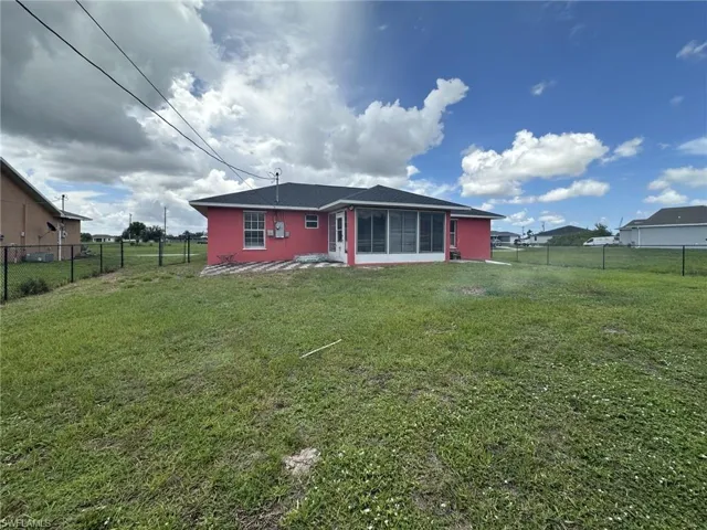 Expansive backyard with a full perimeter fence