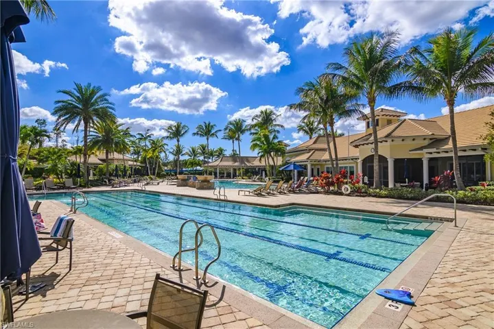 Community pool featuring a patio