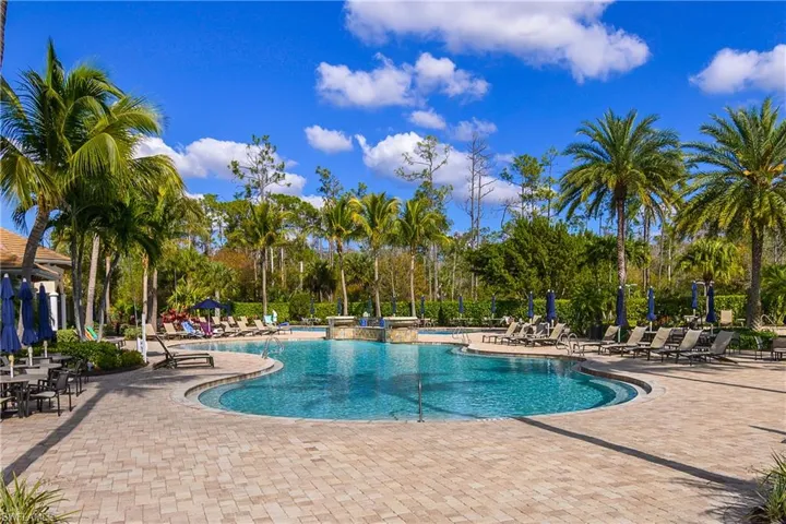 Community pool featuring a patio area