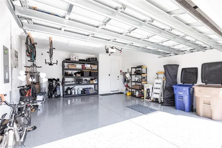 Garage with epoxy flooring.