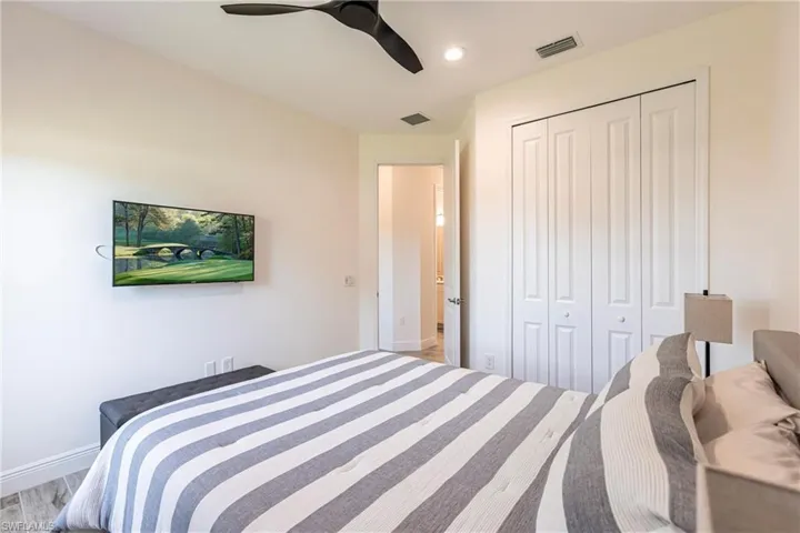 2nd Bedroom featuring hardwood / wood-style flooring, ceiling fan, and a closet