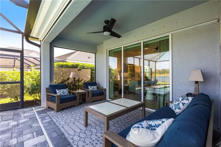 Lanai featuring ceiling fan and a great view of the lake and golf course.