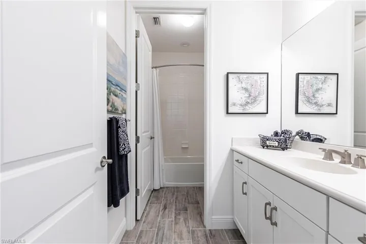 Guest Bathroom view with great lighting and flooring.