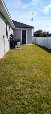 View of yard featuring central AC