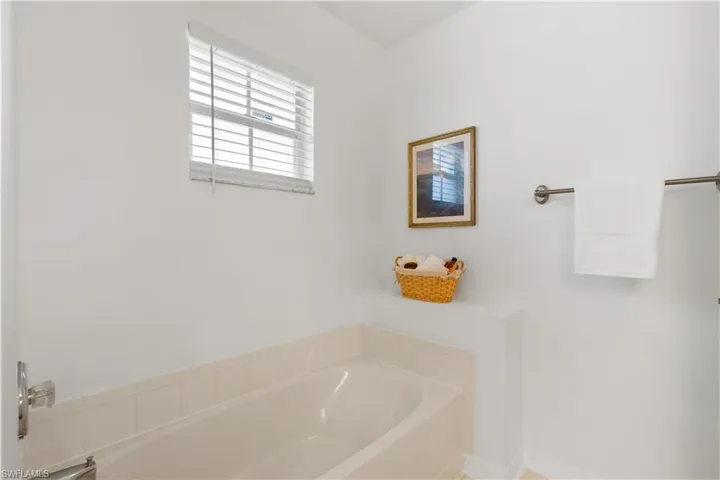 Bathroom with a tub to relax in