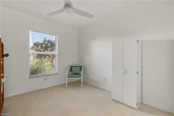 Unfurnished room featuring ceiling fan