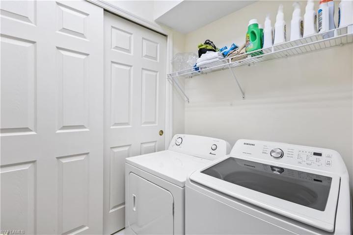 Comfortable sized laundry area.