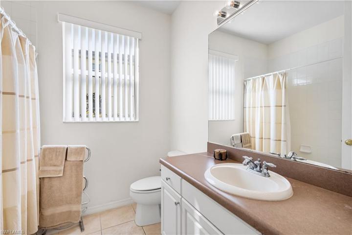 2nd bath has shower/tub combination. Single vanity.