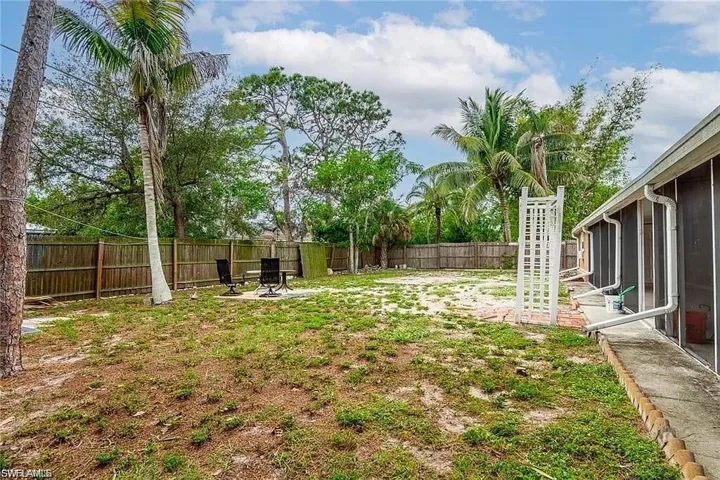 View of fenced backyard