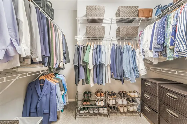 View of spacious master closet