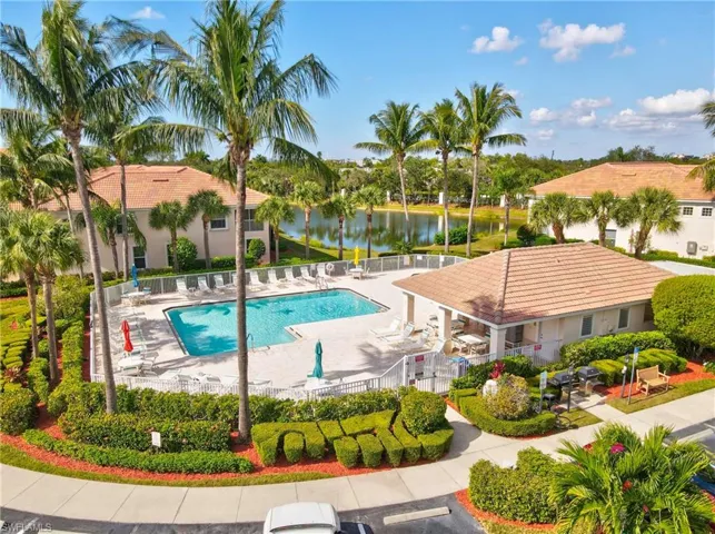 Community pool with cabana and a patio