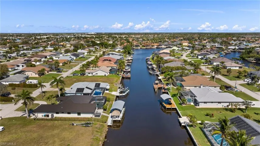 Bird's eye view with a water view and a residential view