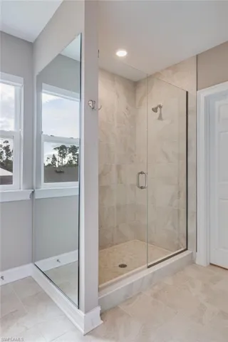 Frameless stall shower